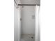 All-white tiled shower with overhead shower head and convenient built-in niche at 15 H Street St, Charleston, SC 29403