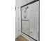 Bathroom shower with glass enclosure and black hardware at 1525 Cypress Pointe Dr, Mount Pleasant, SC 29466