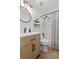 Bathroom with white vanity, black hardware, and shower at 1525 Cypress Pointe Dr, Mount Pleasant, SC 29466