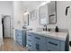 Bathroom featuring double vanity with granite countertops, modern fixtures, and a white door at 1525 Cypress Pointe Dr, Mount Pleasant, SC 29466