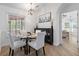 Cozy dining area featuring a round table, modern lighting, and an alcove at 1525 Cypress Pointe Dr, Mount Pleasant, SC 29466