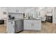 Modern kitchen featuring stainless steel appliances, granite countertops, and white cabinets at 1525 Cypress Pointe Dr, Mount Pleasant, SC 29466