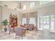 Comfortable lounge area with high ceilings, checkered floors, refined furniture, and ample lighting at 1600 Long Grove Dr # 411, Mount Pleasant, SC 29464
