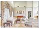 Sophisticated sitting area with high ceilings, elegant furnishings, and decorative sconces at 1600 Long Grove Dr # 411, Mount Pleasant, SC 29464