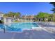 Inviting community swimming pool with sun loungers and well-maintained landscaping at 1600 Long Grove Dr # 411, Mount Pleasant, SC 29464