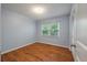 Light and airy bedroom with hardwood floors, a window, and a closet at 1673 Sulgrave Rd, Charleston, SC 29414