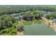An aerial view of a lovely lakeside community surrounded by lush trees and serene water at 1709 Blalock St, Mount Pleasant, SC 29466