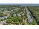 A picturesque aerial view of an elegant townhome community featuring lush landscaping and lake views at 1709 Blalock St, Mount Pleasant, SC 29466