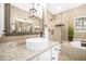 Bathroom with a vessel sink, granite countertop, framed mirror, and a walk-in shower at 1709 Blalock St, Mount Pleasant, SC 29466