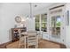 Charming dining area with table, chairs, and views of the outdoor patio at 1709 Blalock St, Mount Pleasant, SC 29466
