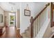 Inviting home foyer featuring a staircase, hardwood floors, and a welcoming entrance, perfect for first impressions at 1709 Blalock St, Mount Pleasant, SC 29466
