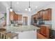 Kitchen featuring granite countertops, stainless steel appliances, and wooden cabinets, perfect for cooking enthusiasts at 1709 Blalock St, Mount Pleasant, SC 29466