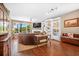 Cozy living room with lake view, built-in shelving, and a stylish fireplace at 1709 Blalock St, Mount Pleasant, SC 29466