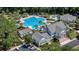 A beautiful pool area with inviting waterslides and amenities, set amongst palm trees and shady seating at 1709 Blalock St, Mount Pleasant, SC 29466