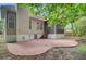 Spacious backyard with a stamped concrete patio and view of the house's exterior at 1851 Oleander Ct, Charleston, SC 29414