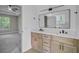 Primary bathroom features dual vanity, white quartz countertops and modern finishes at 1851 Oleander Ct, Charleston, SC 29414