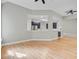 Open-concept living area showcasing hardwood floors and adjacent kitchen at 1851 Oleander Ct, Charleston, SC 29414