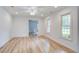 Bright bedroom with natural light, recessed lighting and wood-look floors at 19 Milano Ct, Hanahan, SC 29410