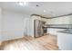 Modern kitchen with stainless steel appliances, updated white cabinets, and an open layout at 19 Milano Ct, Hanahan, SC 29410