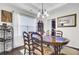 Bright dining room with elegant lighting at 192 Weeping Cypress Dr, Moncks Corner, SC 29461