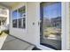 Inviting entrance with a storm door at 192 Weeping Cypress Dr, Moncks Corner, SC 29461