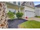 Charming home featuring a two-car garage and manicured landscaping at 192 Weeping Cypress Dr, Moncks Corner, SC 29461