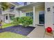 Charming home exterior showcasing a well-manicured lawn and inviting entrance, perfect curb appeal at 192 Weeping Cypress Dr, Moncks Corner, SC 29461