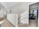 Upstairs hallway, carpeted with doors leading to the bedrooms at 192 Weeping Cypress Dr, Moncks Corner, SC 29461