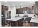 Modern kitchen boasts stainless steel appliances and a large island at 192 Weeping Cypress Dr, Moncks Corner, SC 29461