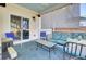 Relaxing screened-in patio featuring comfortable seating, stylish decor, and a tranquil ambiance at 192 Weeping Cypress Dr, Moncks Corner, SC 29461