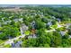 A beautiful neighborhood with ponds and mature trees are showcased in this lovely aerial view of the community at 200 Oak Point Landing Dr, Mount Pleasant, SC 29464
