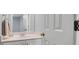 Powder room featuring a single sink, mirror, and pastel walls at 200 Oak Point Landing Dr, Mount Pleasant, SC 29464