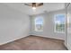 Bright bedroom boasting two windows, plush carpeting, and ample closet space at 200 Oak Point Landing Dr, Mount Pleasant, SC 29464