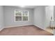 Neutral bedroom showcasing a window with a view of the outdoors at 200 Oak Point Landing Dr, Mount Pleasant, SC 29464