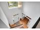Sunlit foyer with high ceilings, hardwood floors, and elegant staircase at 200 Oak Point Landing Dr, Mount Pleasant, SC 29464