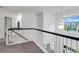Hallway overlooking the foyer and has a window with neighborhood views at 200 Oak Point Landing Dr, Mount Pleasant, SC 29464