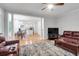 Open-concept living space seamlessly connects living and kitchen areas with hardwood flooring at 200 Oak Point Landing Dr, Mount Pleasant, SC 29464