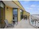 Spacious balcony with comfortable seating, perfect for enjoying ocean views and fresh air at 201 W Arctic Ave # 406, Folly Beach, SC 29439