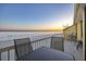 Private balcony offers ocean views and the perfect place to relax and unwind after a long day at 201 W Arctic Ave # 406, Folly Beach, SC 29439