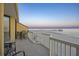 Lovely balcony with seating and beautiful ocean view perfect for relaxing and enjoying the sunrise at 201 W Arctic Ave # 406, Folly Beach, SC 29439