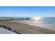 Beach scene with a pier and oceanfront views offering relaxing and scenic experiences on the coast at 201 W Arctic Ave # 406, Folly Beach, SC 29439