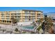 Oceanfront building with a pool and beach access, perfect for a vacation getaway with relaxing amenities at 201 W Arctic Ave # 406, Folly Beach, SC 29439