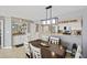 View of dining area and kitchen with pantry at 201 W Arctic Ave # 406, Folly Beach, SC 29439