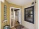 Welcoming entryway featuring a welcome sign and a view into the condo's interior at 201 W Arctic Ave # 406, Folly Beach, SC 29439
