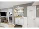 Butler pantry with a mirror and view of bedroom at 201 W Arctic Ave # 406, Folly Beach, SC 29439