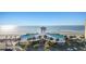 Pier building overlooking the beach offering a scenic spot for relaxation and enjoyment by the sea at 201 W Arctic Ave # 406, Folly Beach, SC 29439