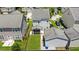 Aerial view of home highlighting a fenced yard, detached garage, and screened-in back porch at 2025 Maybelles Ln, Charleston, SC 29414