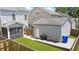 Backyard features a screened porch, a deck, and a well-maintained lawn, perfect for outdoor gatherings at 2025 Maybelles Ln, Charleston, SC 29414