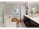 Bathroom featuring a vanity, stand up shower, and a garden style tub at 2025 Maybelles Ln, Charleston, SC 29414