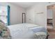 Comfortable bedroom with a soft color palette, creating a peaceful and inviting retreat with natural lighting at 2025 Maybelles Ln, Charleston, SC 29414